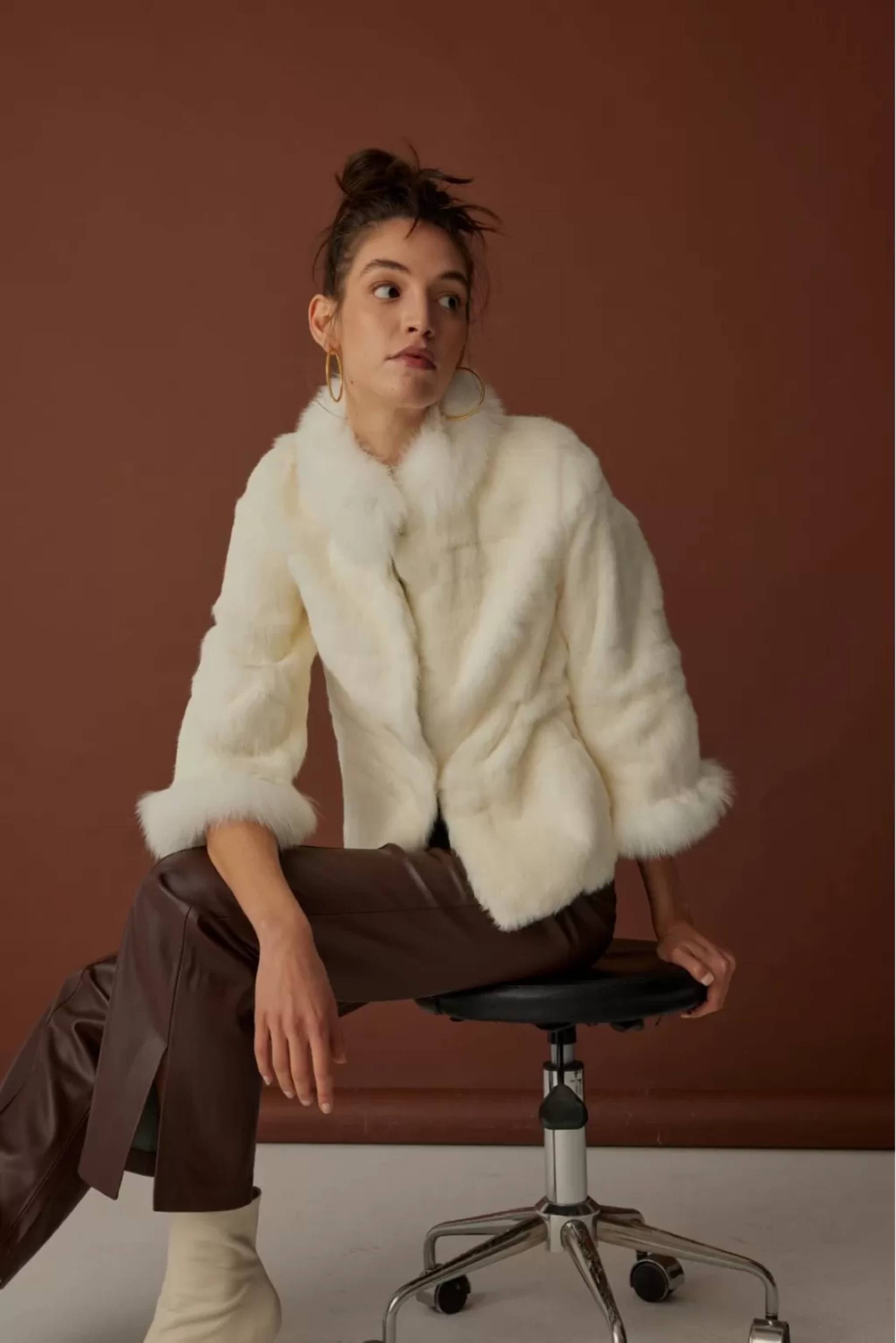 Short Black Fur Coat with Fox Detail and Cascading Patterns